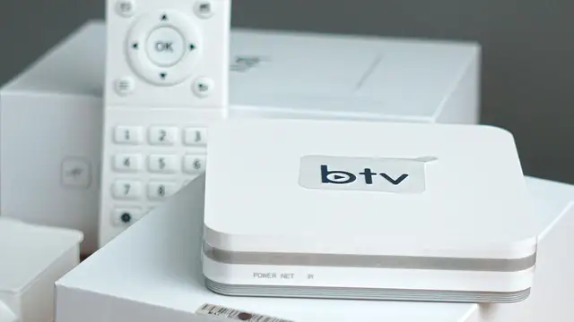 Smart TV streaming box and remote controls ready for setup