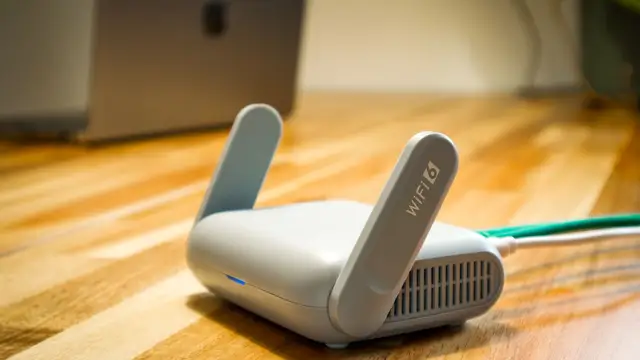 Modern Wi-Fi 6 router connected on a home desk